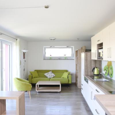 Wohn- und Essbereich der Wohnung Kiwi